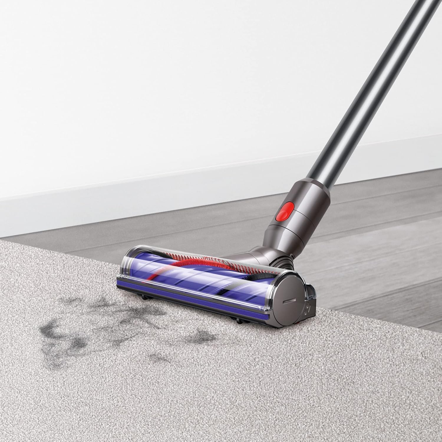 Dyson V8 Extra Vacuum sweeping up pet hair
